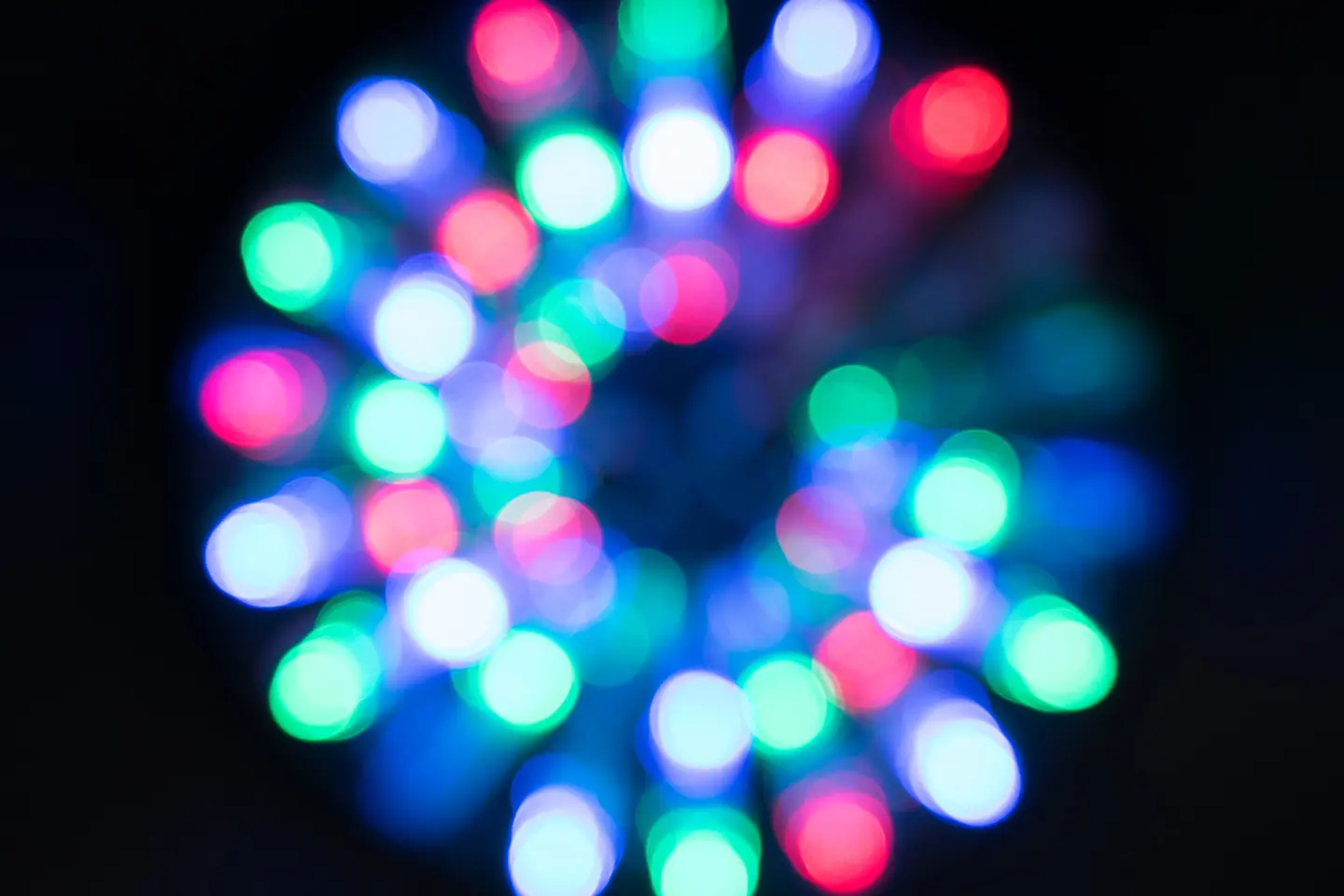 blurry green, red and blue lights in circles