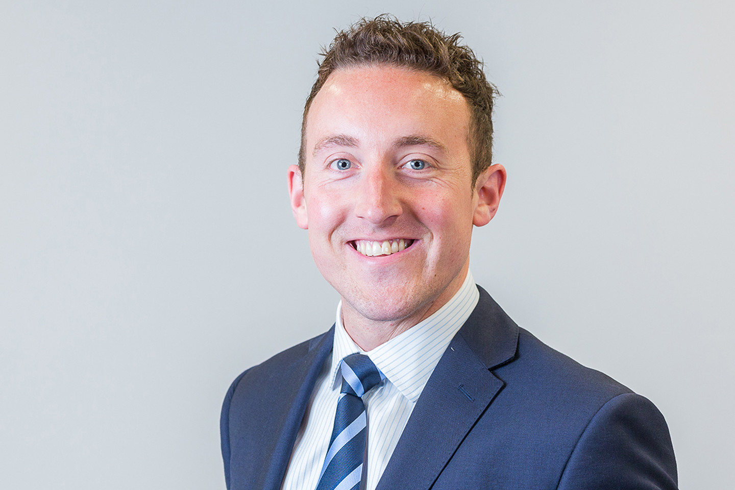 Headshot of Christian Burns-Di Lauro
