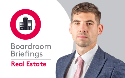 Boardroom Briefings Real Estate branding with cityscape logo with Tom Stevenson.