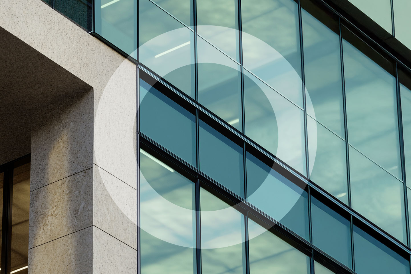 'O' overlayed on glass windows of building