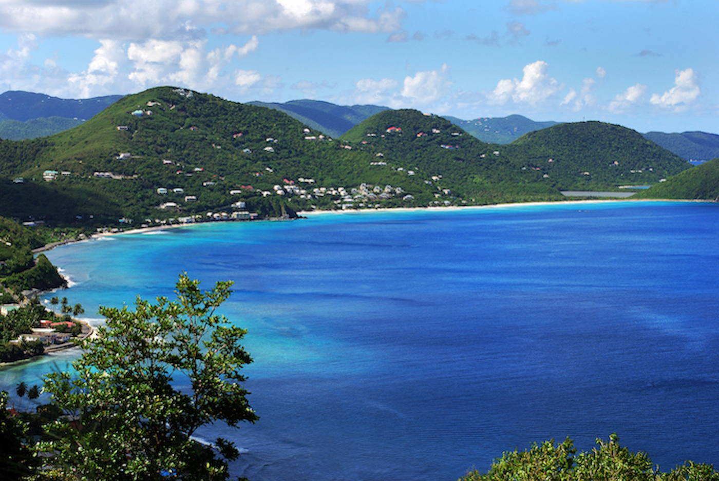 British Virigin Islands beach with sea and green hills