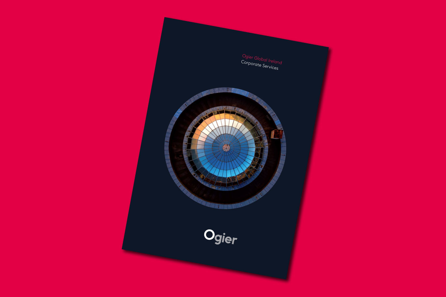 Ogier Global Corporate Services Ireland cover features a abstract Ogier logo illustration with blue and gold concentric rings on a dark background