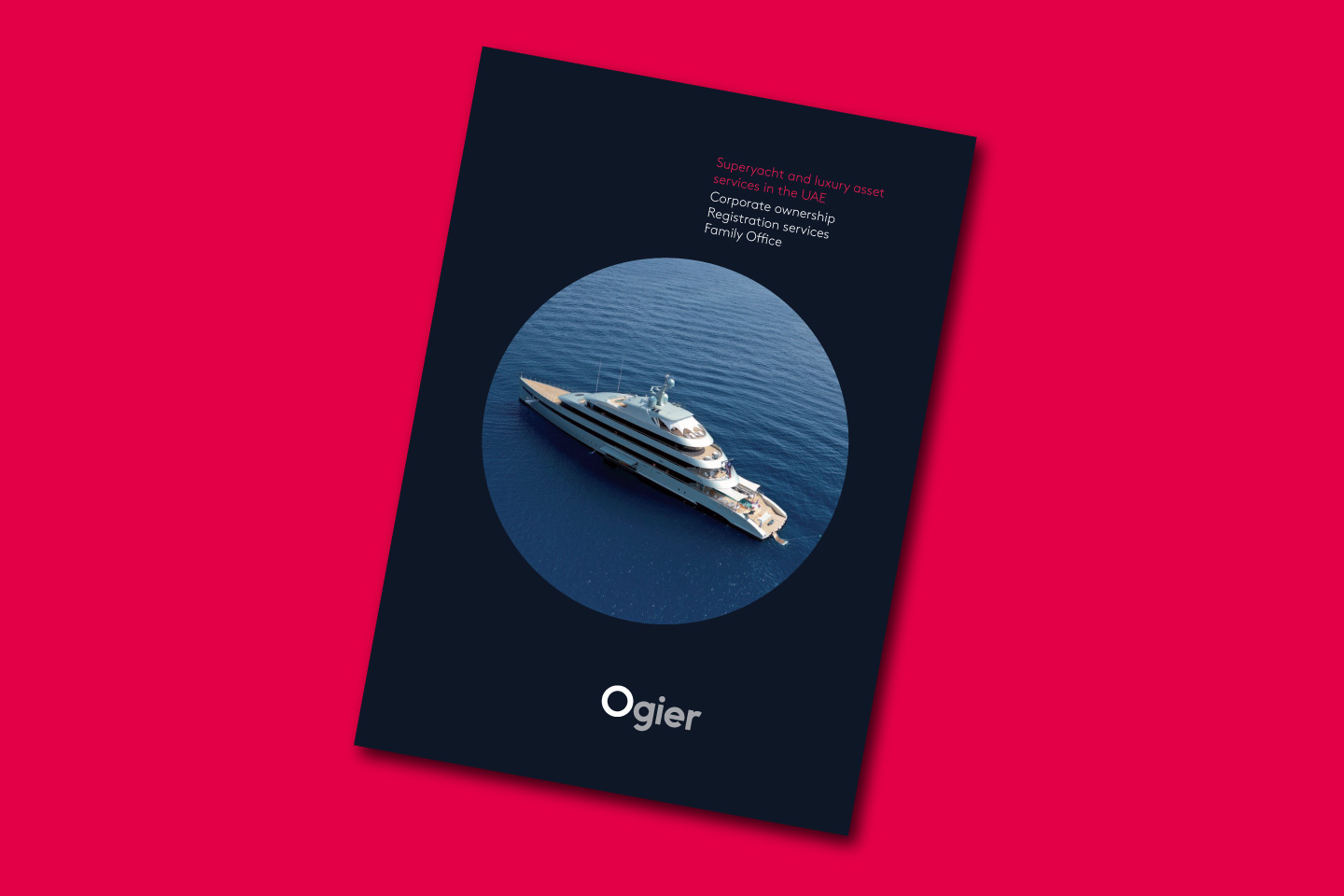 Ogier Superyacht and luxury asset services UAE brochure cover featuring elegant yacht cruising on calm blue sea, with modern branding