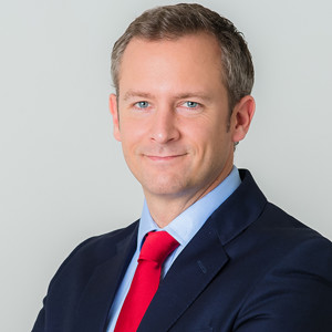 Headshot of Justin Savage
