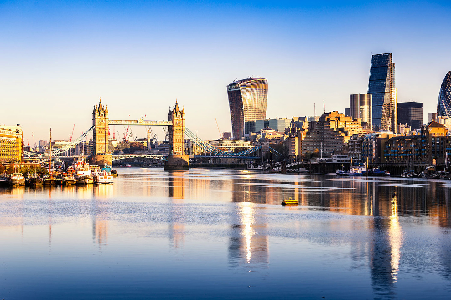 river Thames view of London skyline including London Bridge